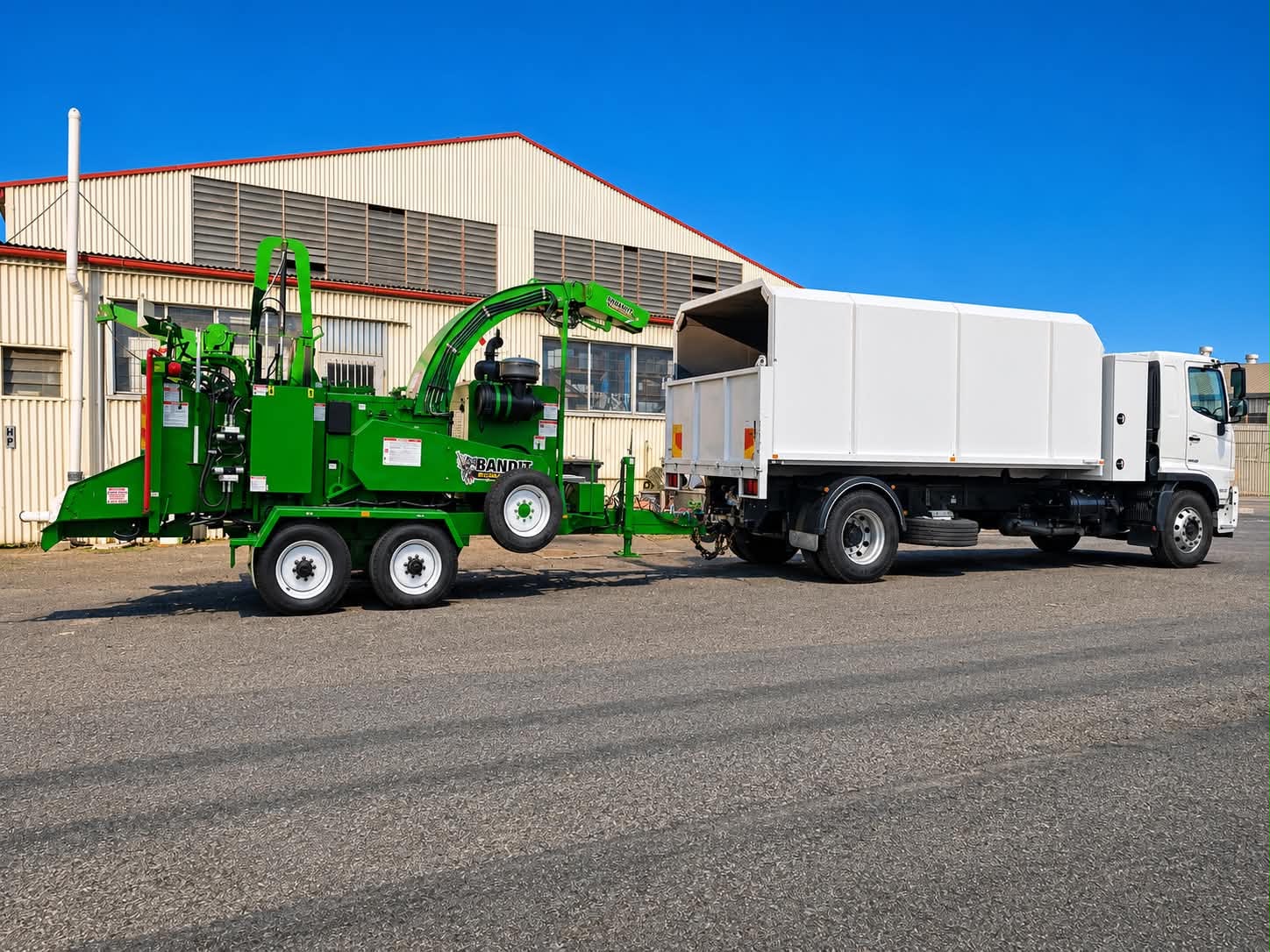 Mac's tipper truck and wood chipper